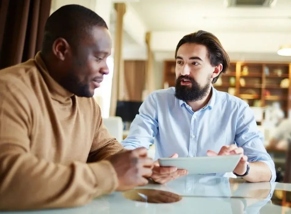2 men talking