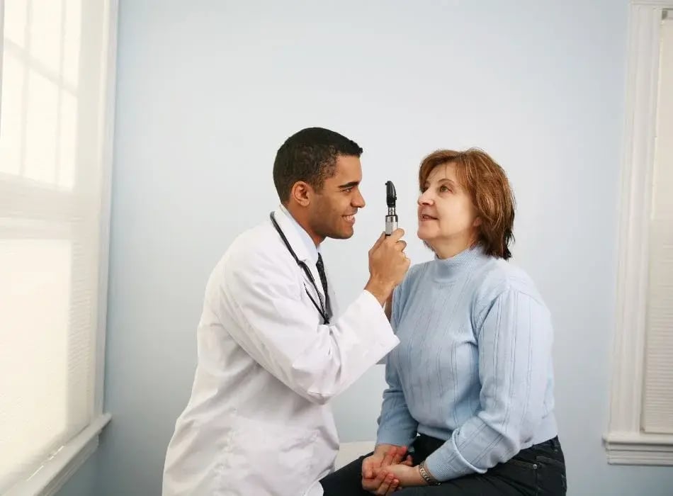 woman getting eye exam